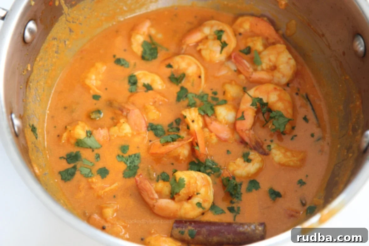 shrimp curry with cilantro in a pot