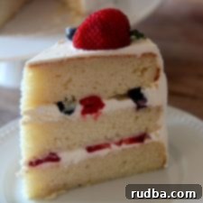 Berry Medley Cake 4 Beautiful three-layer Triple Berry Cake with fresh summer berries and light vanilla frosting.