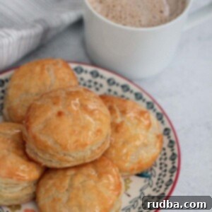 pastelitos de carne with a cup of coffee.