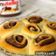 Homemade Nutella Cinnamon Rolls with Cream Cheese Frosting