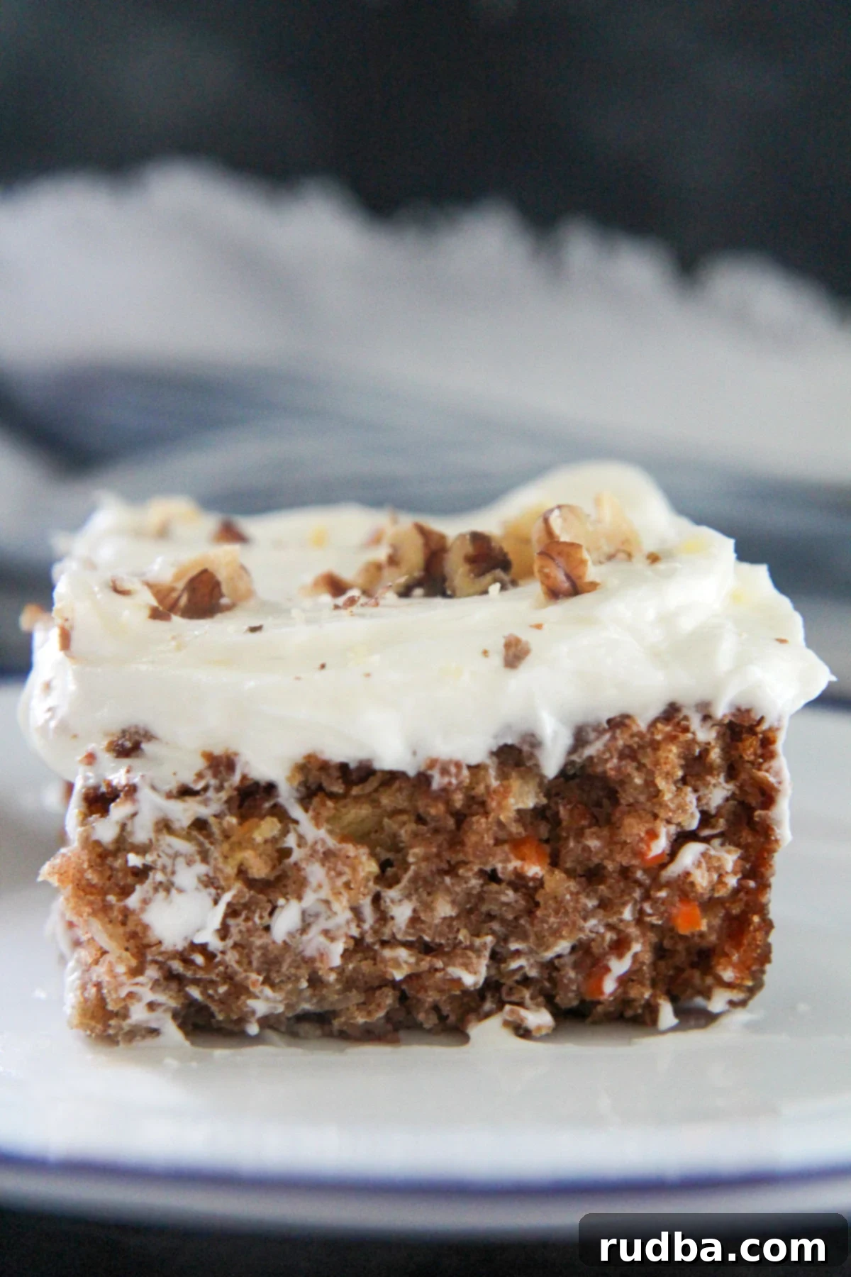 a slice of carrot cake up close 