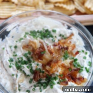 French Onion Dip with potato chips in a bowl