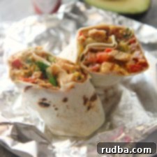 Tex-Mex Chicken Fiesta Wrap 10 tex mex grilled chicken burrito on aluminum foil.