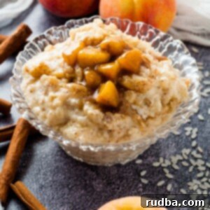 Peachy Rice Dream 6 rice pudding and peaches in a glass bowl with peaches on the side
