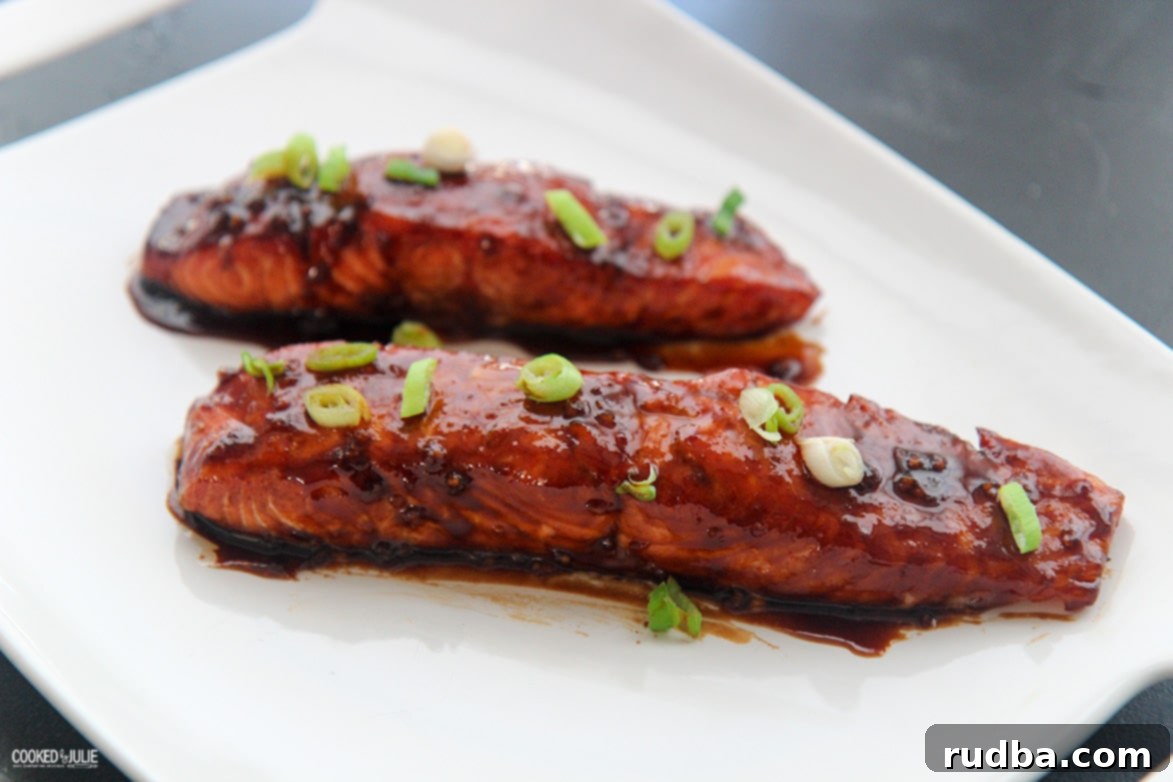 baked salmon on a white plate 