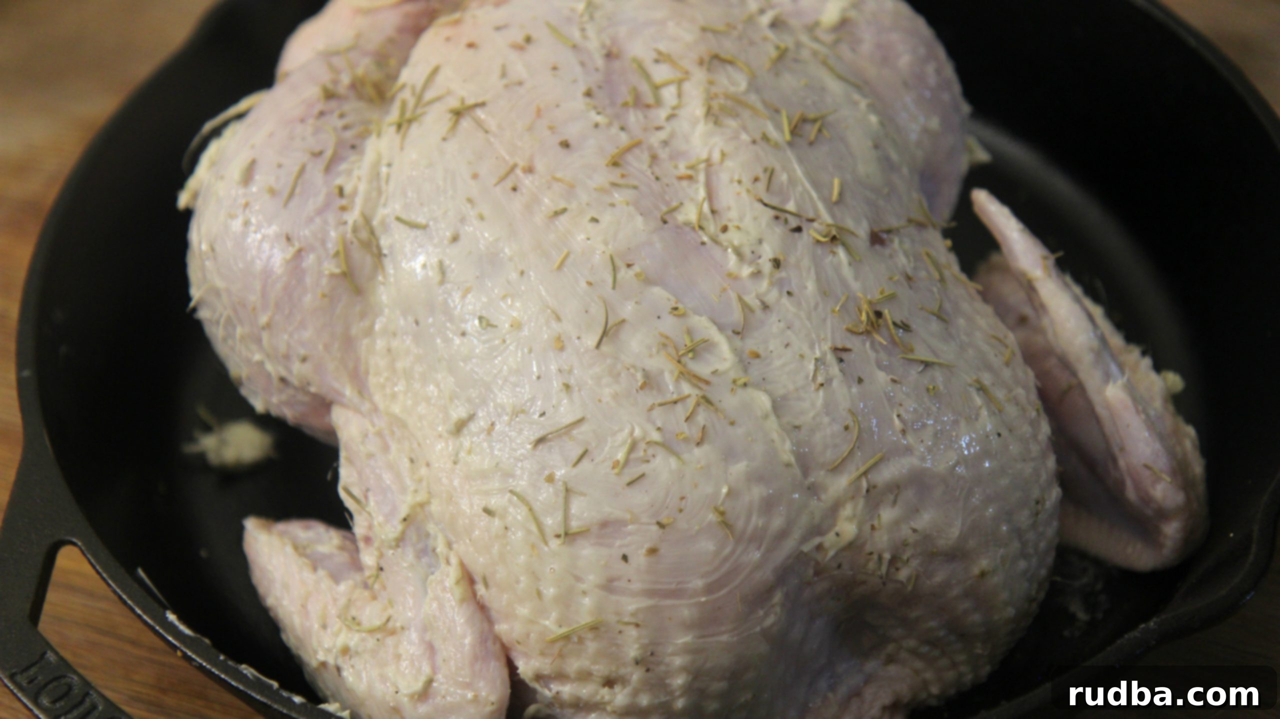 The herb butter rub is the secret to keeping this chicken moist and juicy during the roasting process