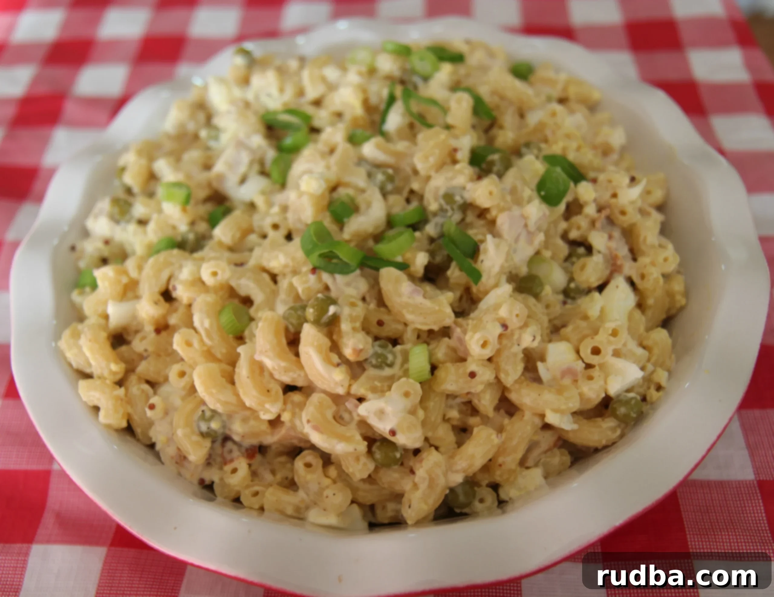 Creamy Macaroni Chicken Salad 2 Creamy chicken macaroni salad with onion for a fresh bite of flavor.