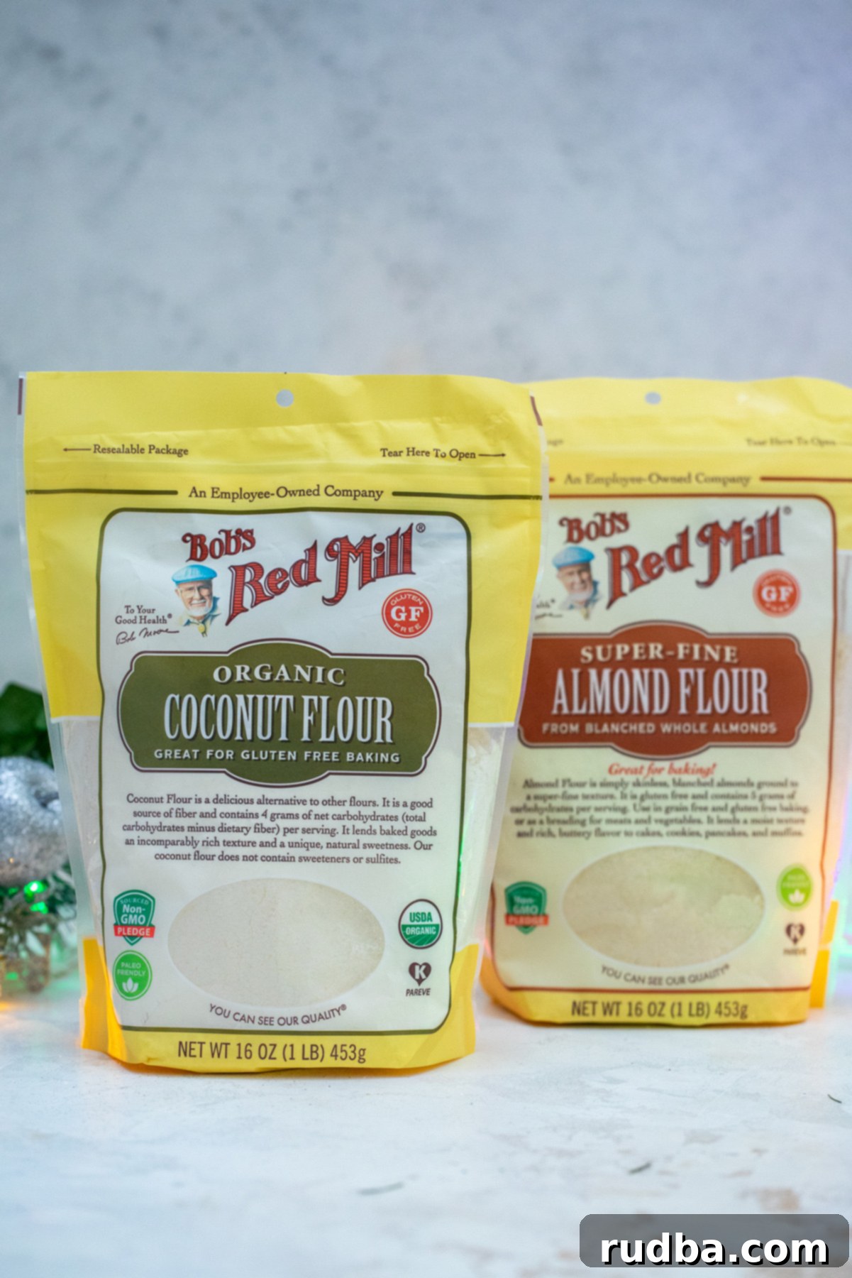 Bags of Bob's Red Mill Organic Coconut Flour and Super Fine Almond Flour, key ingredients for gluten-free baking.