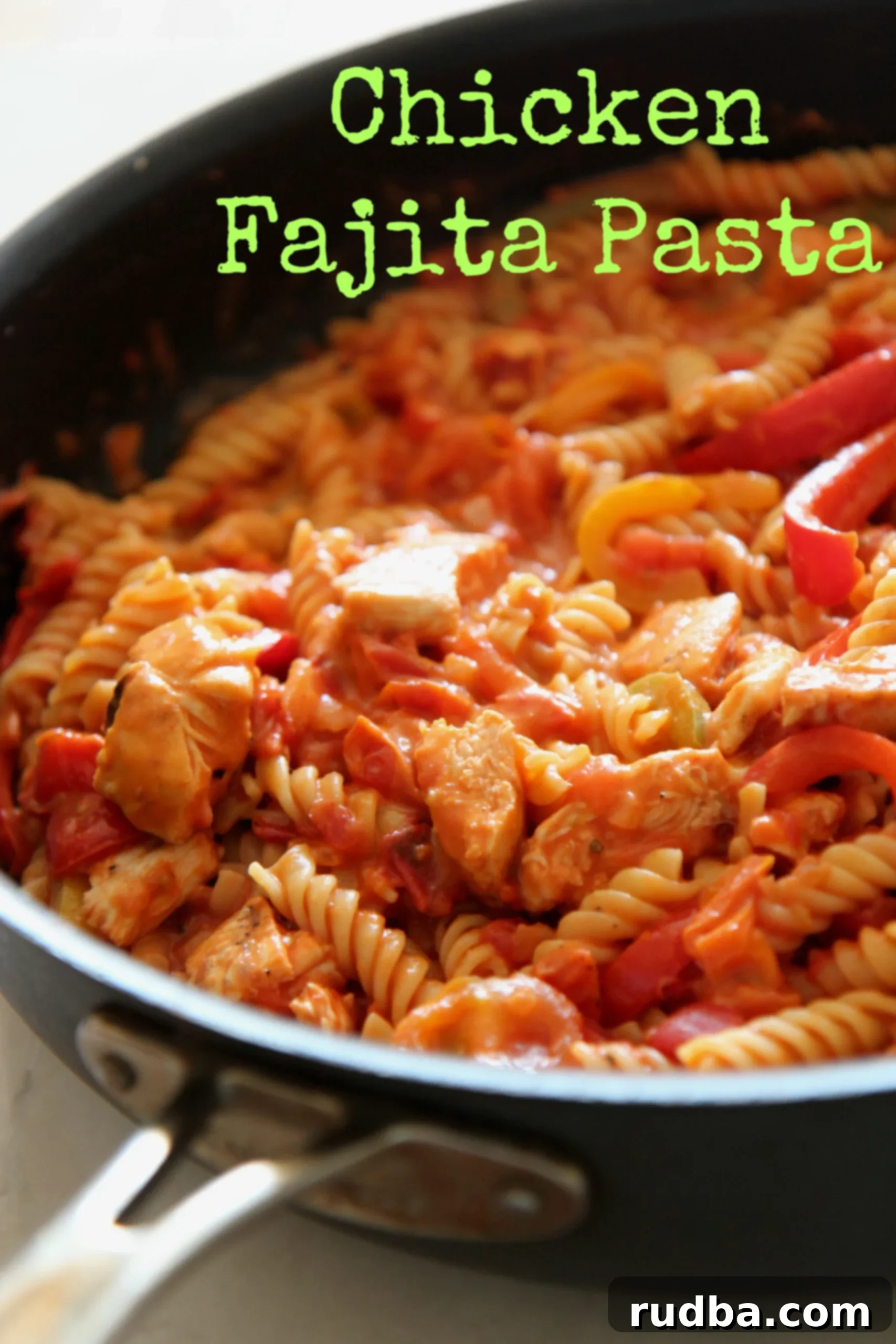 Toss together this easy chicken fajita pasta dish for a fast, flavorful, and largely one-pan meal that everyone will love!
