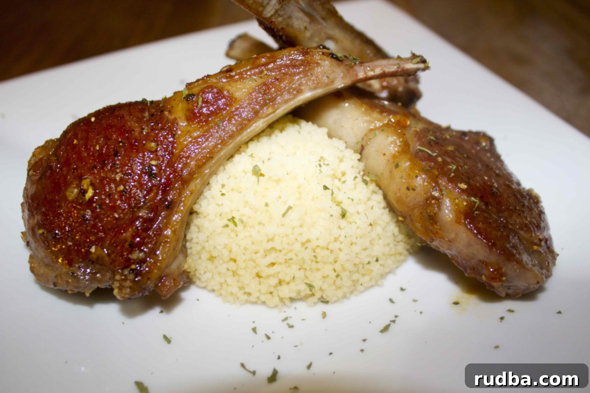 Close-up of the spice blend and the honey garlic glaze ready for lamb chops