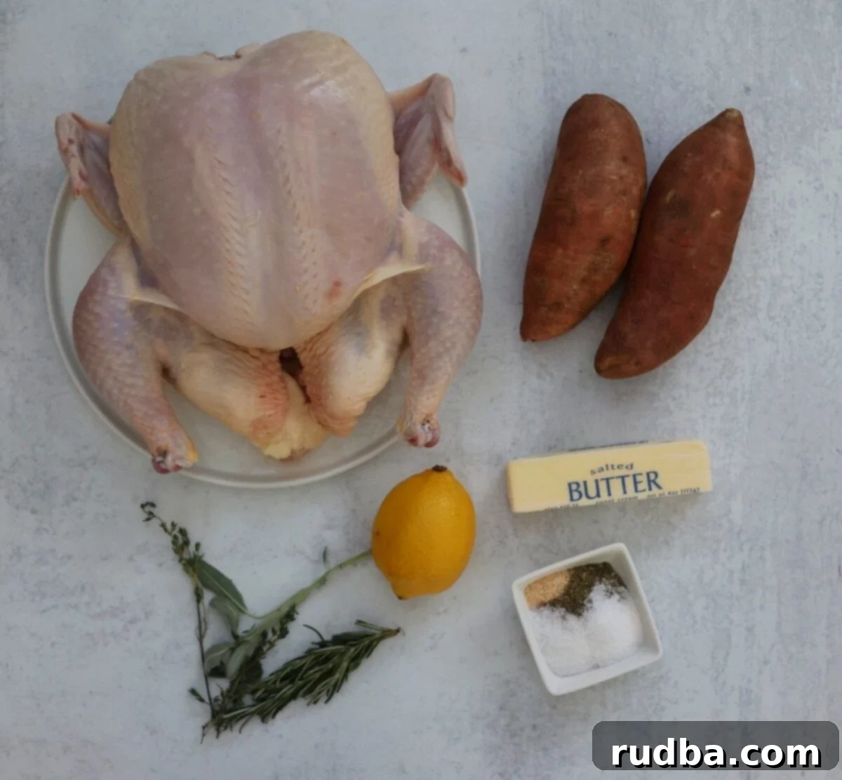 Roasted Spatchcock Chicken and Root Vegetables 3 Whole chicken, sweet potatoes, spices, butter, lemon, and herbs.