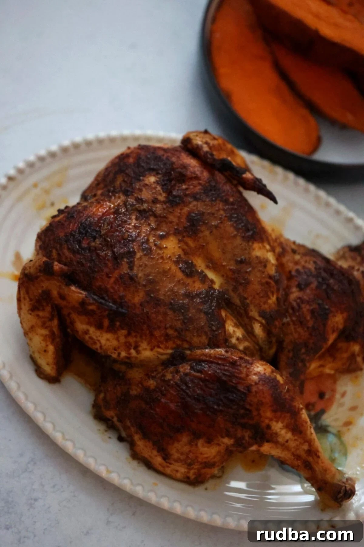 Roasted Spatchcock Chicken and Root Vegetables 6 cooked spatchcock chicken up close.